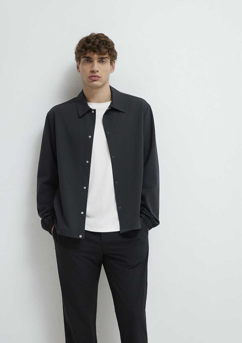 Mavi Su İtici Kapüşonlu Siyah Loose Fit Erkek Şişme Mont 0110754-71379 - Mavi